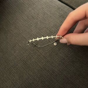 Silver bracelet with white details